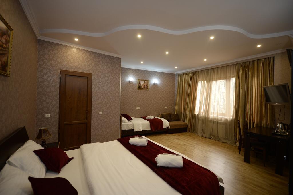 Begi Hotel Тбилиси Стая снимка